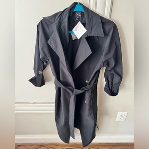 Beautiful light weight trench coat size small new with tags in black